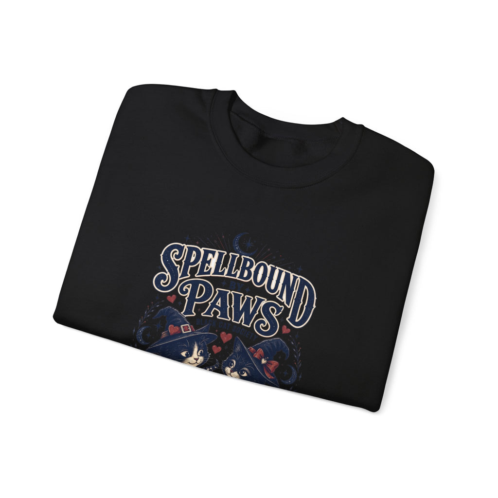 Black crewneck sweatshirt folded to show the two black cats in witch hats print