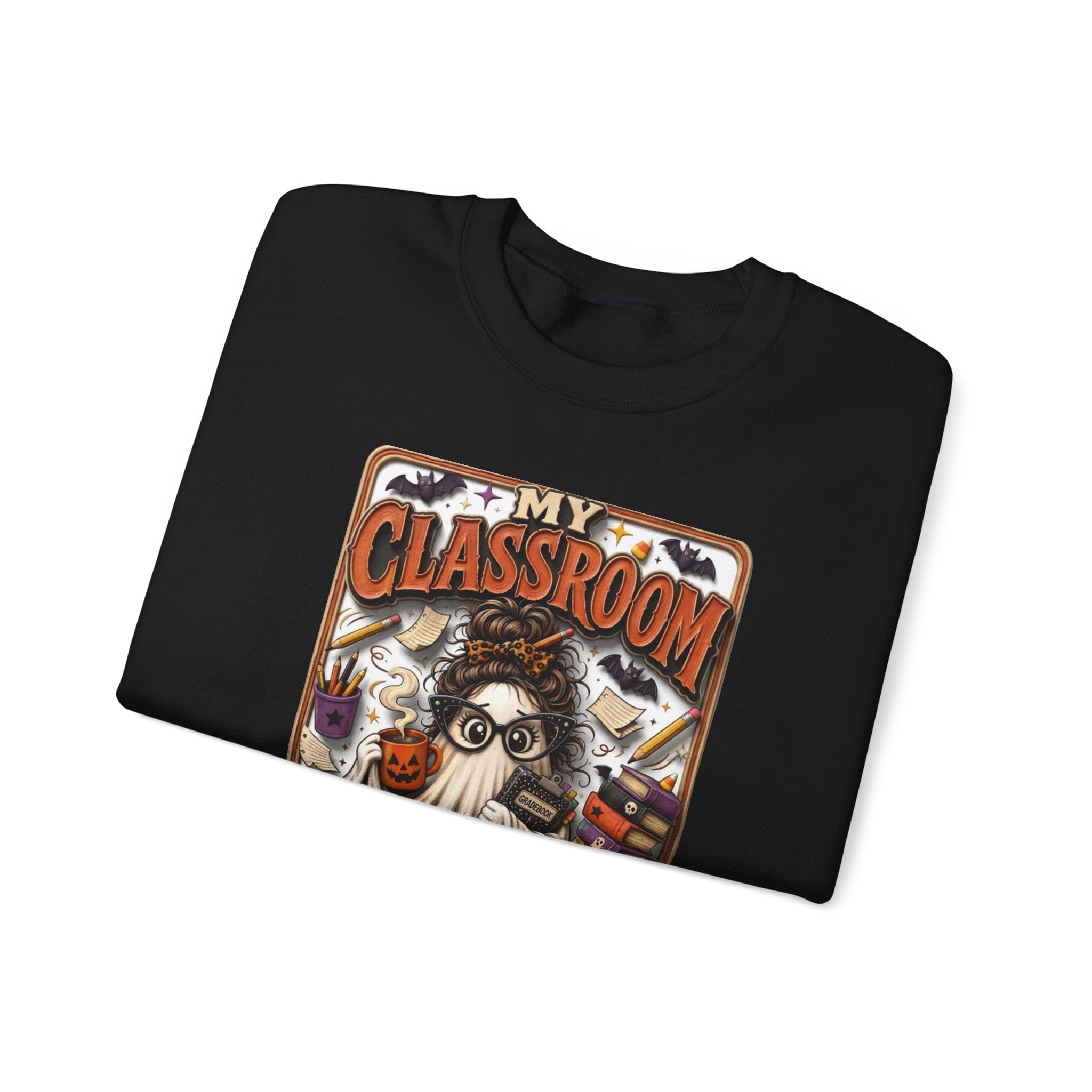 Black crewneck sweatshirt folded to show the bespectacled ghost with a messy bun grades away among print