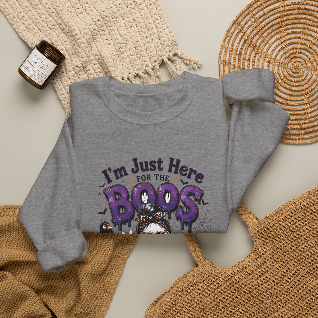 Graphite Heather crewneck sweatshirt styled flat with a candle — three cartoon ghosts in sunglasses