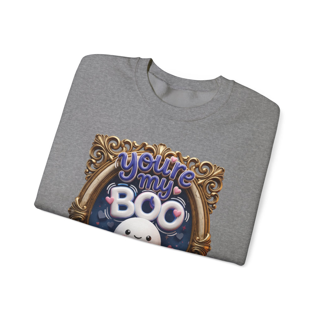 Graphite Heather crewneck sweatshirt folded to show the round smiling ghost floats inside a gilded vintage frame print