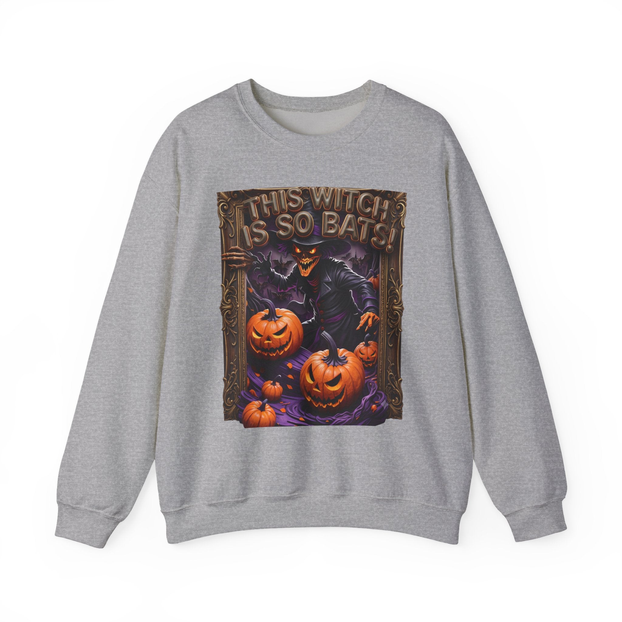 Sport Grey crewneck sweatshirt laid flat, printed with a grinning witch in a pointed hat looms over glowing