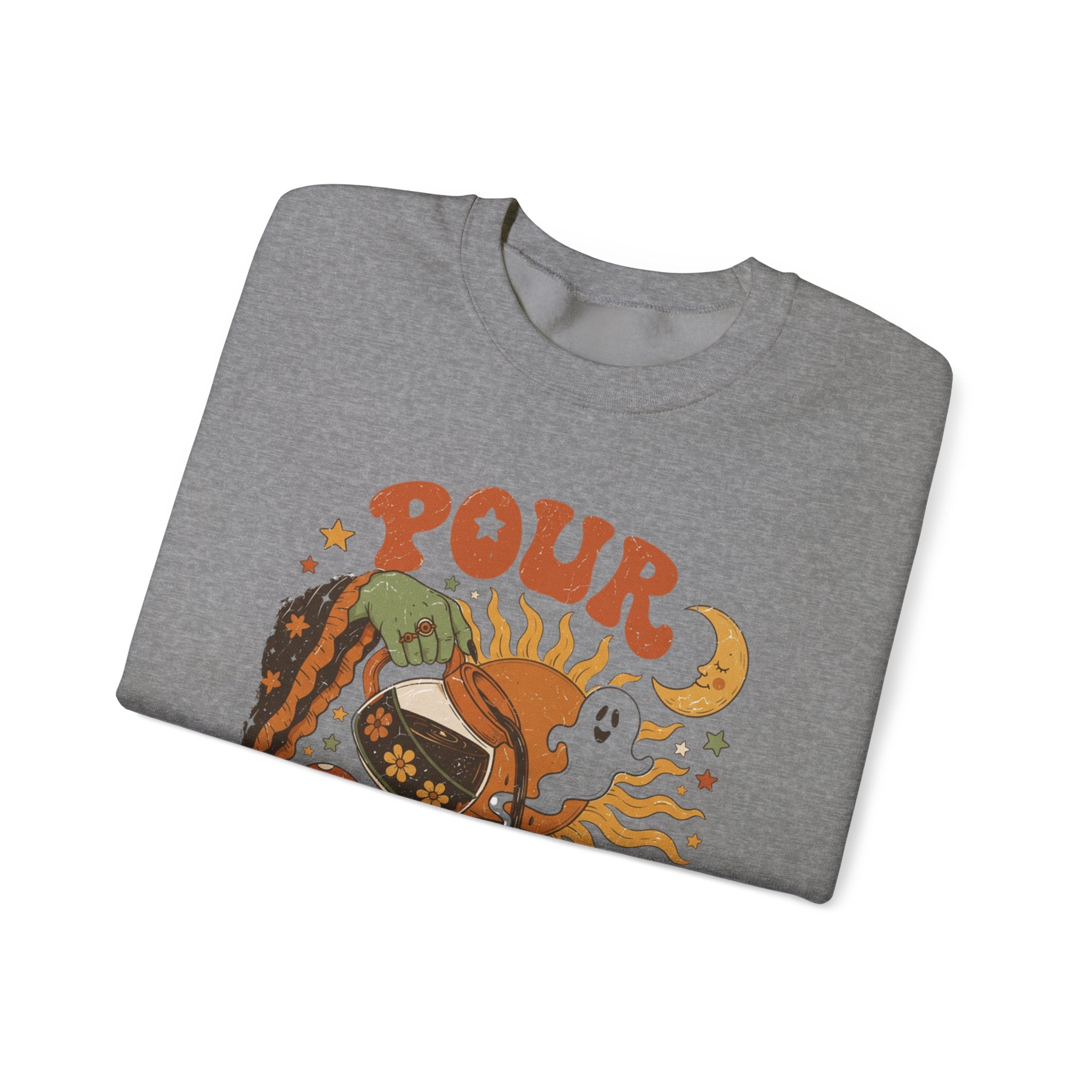 Graphite Heather crewneck sweatshirt folded to show the green witch hand tipping a flower-patterned coffee pot into print