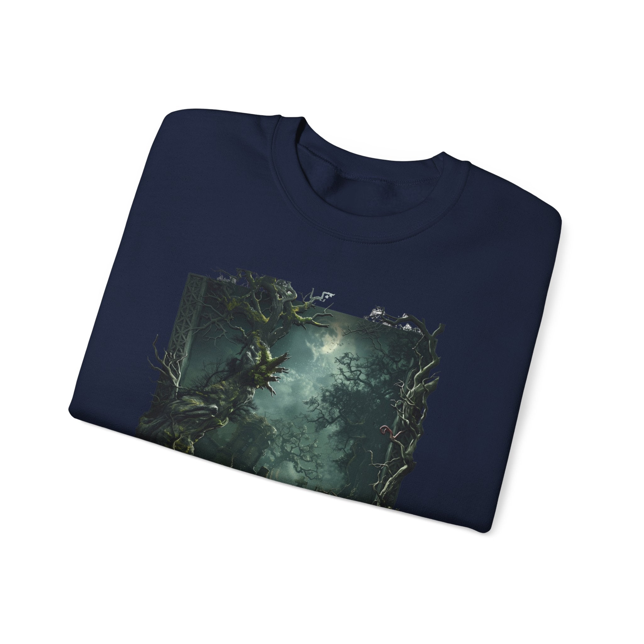 Navy crewneck sweatshirt folded to show the moonlit forest of gnarled mossy trees drifts into pale print