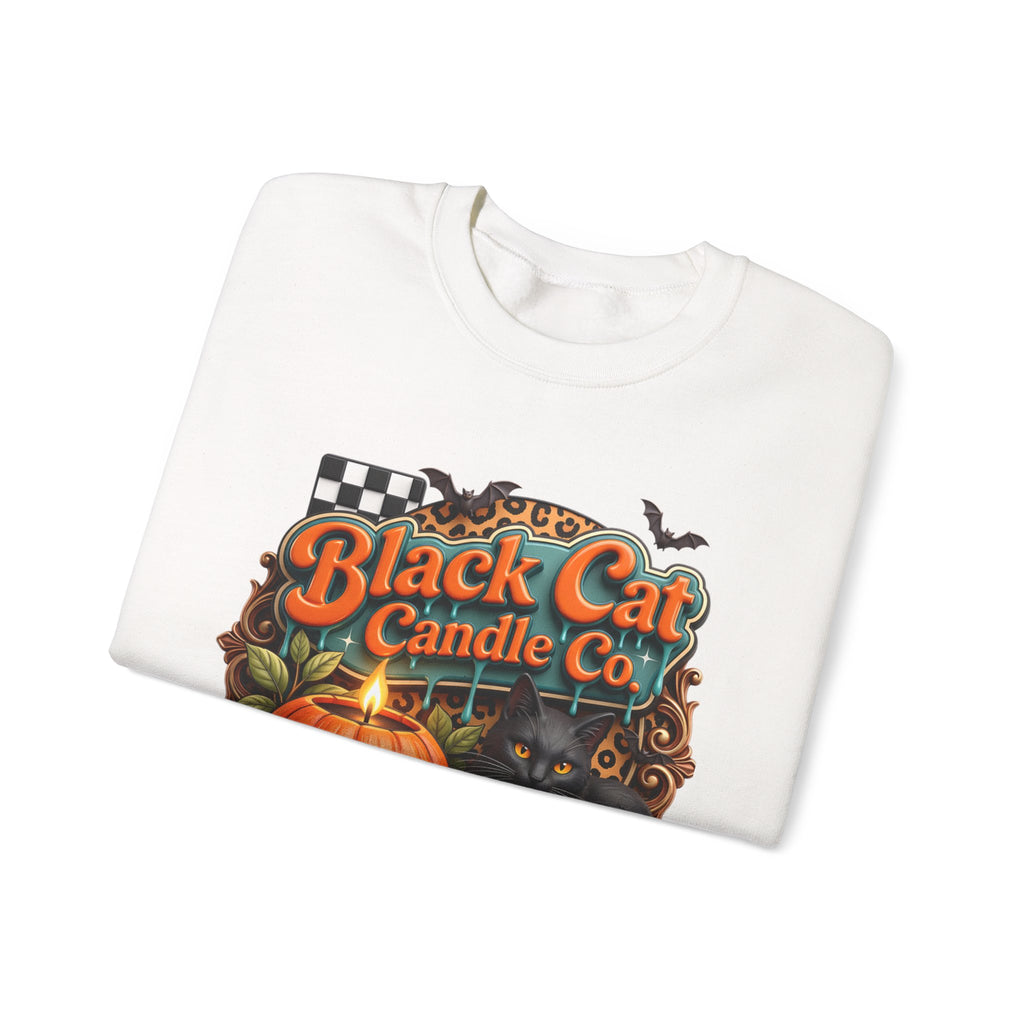 White crewneck sweatshirt folded to show the retro teal signboard reads black cat candle co print