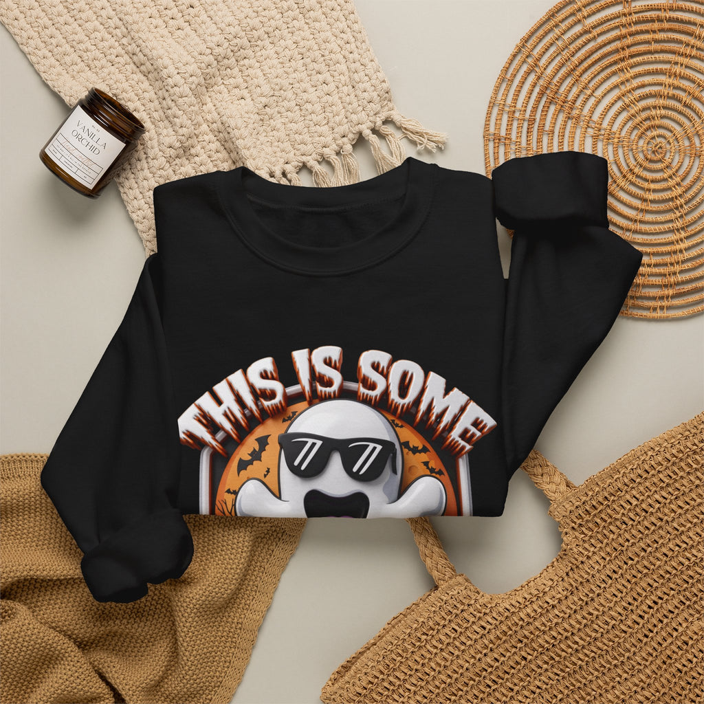 Black crewneck sweatshirt styled flat with a candle — cartoon ghost in dark sunglasses