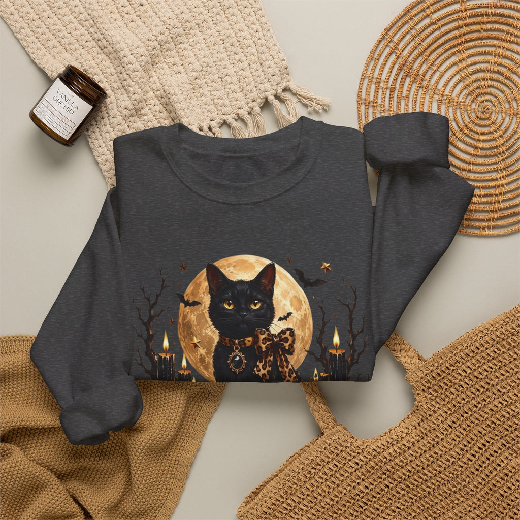 Dark Heather crewneck sweatshirt styled flat with a candle — black cat before a full moon