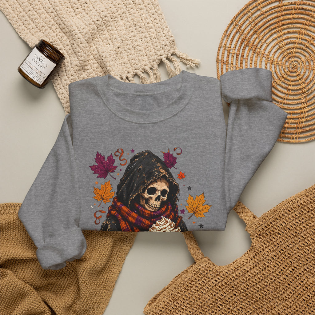 Graphite Heather crewneck sweatshirt styled flat with a candle — hooded skeleton with pumpkin spice drink