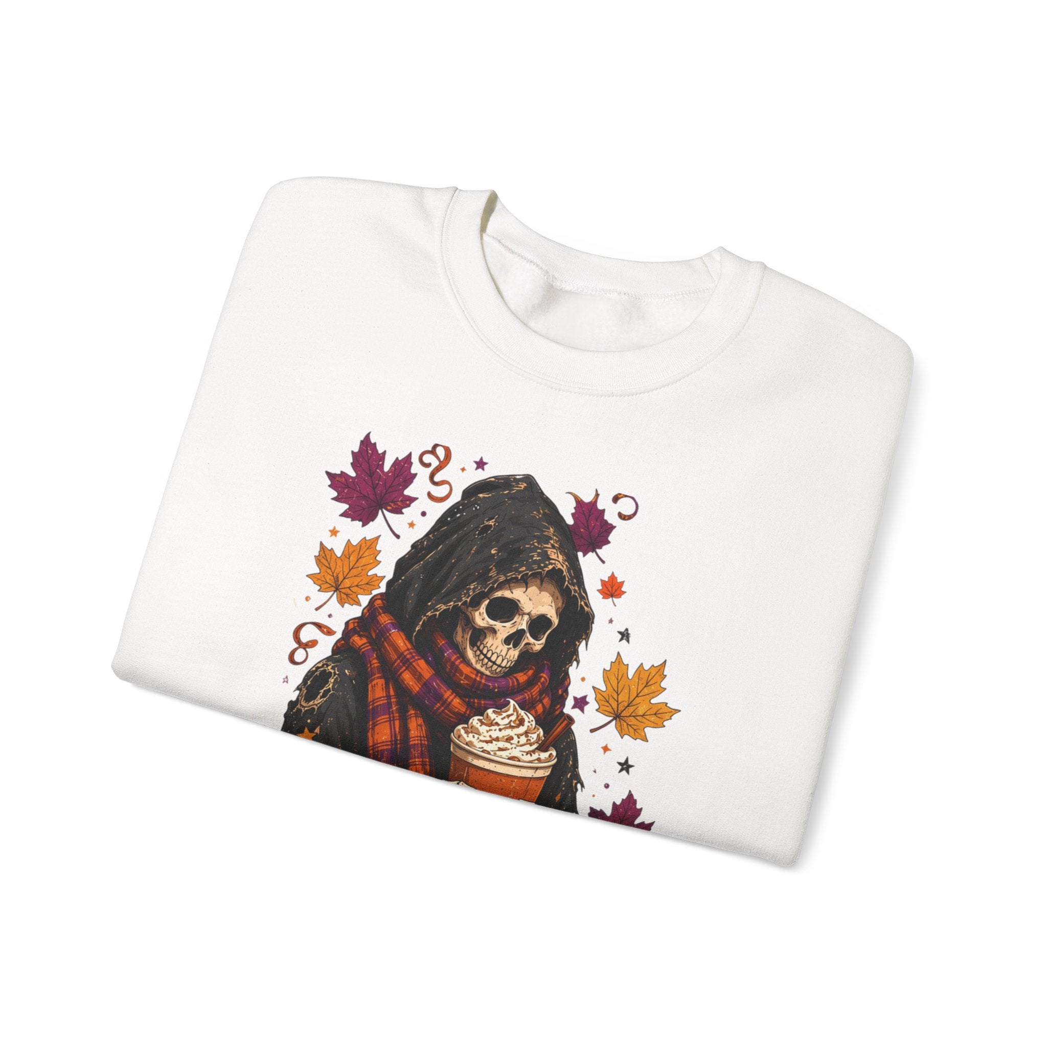 White crewneck sweatshirt folded to show the hooded skeleton holding a pumpkin spice drink print