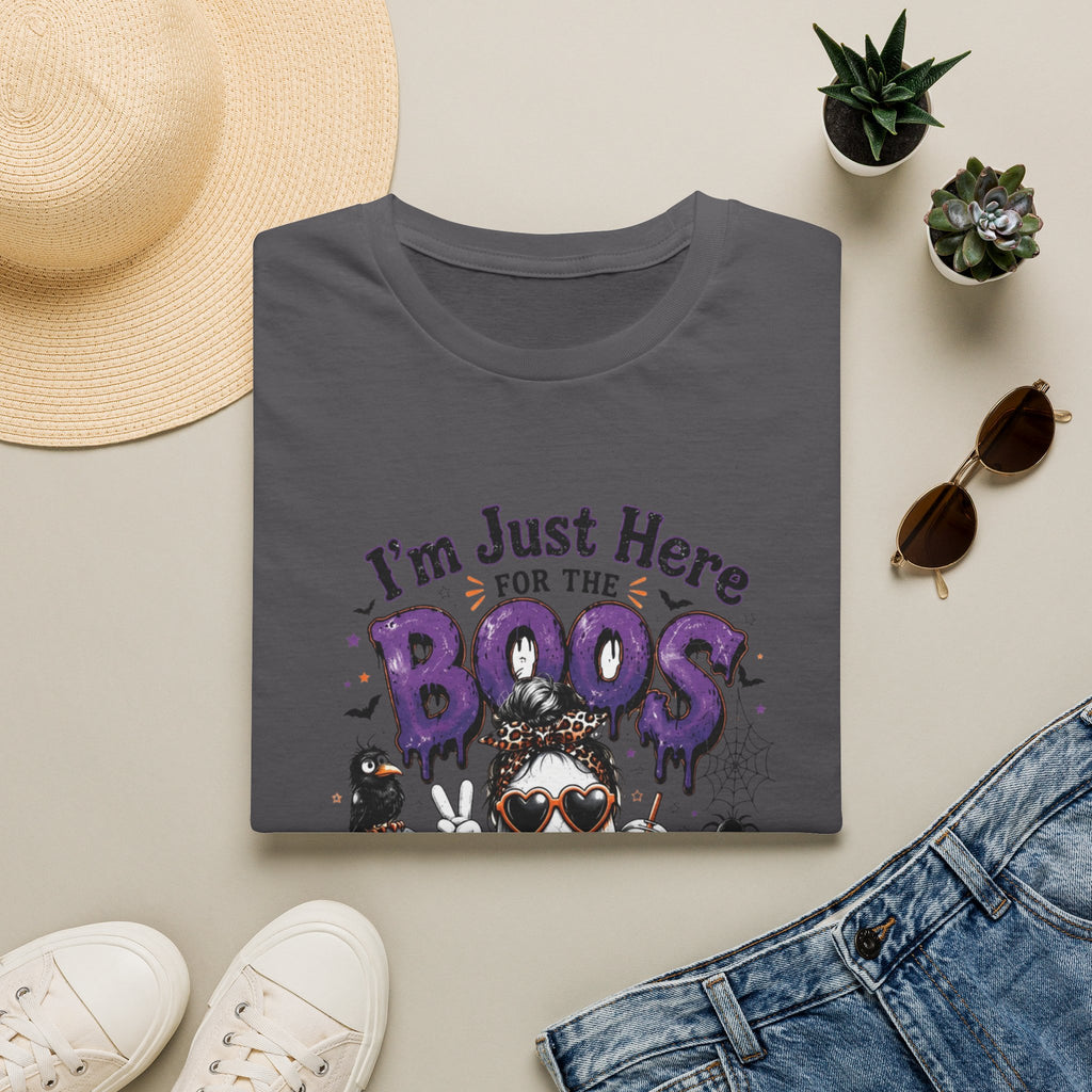 Charcoal t-shirt styled flat with a candle — cartoon ghosts in sunglasses over pumpkins
