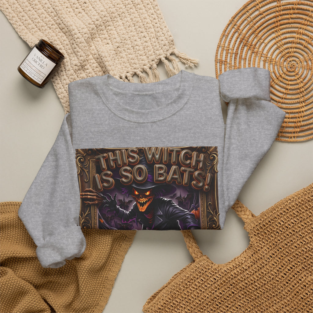 Sport Grey crewneck sweatshirt styled flat with a candle — grinning witch in a pointed hat