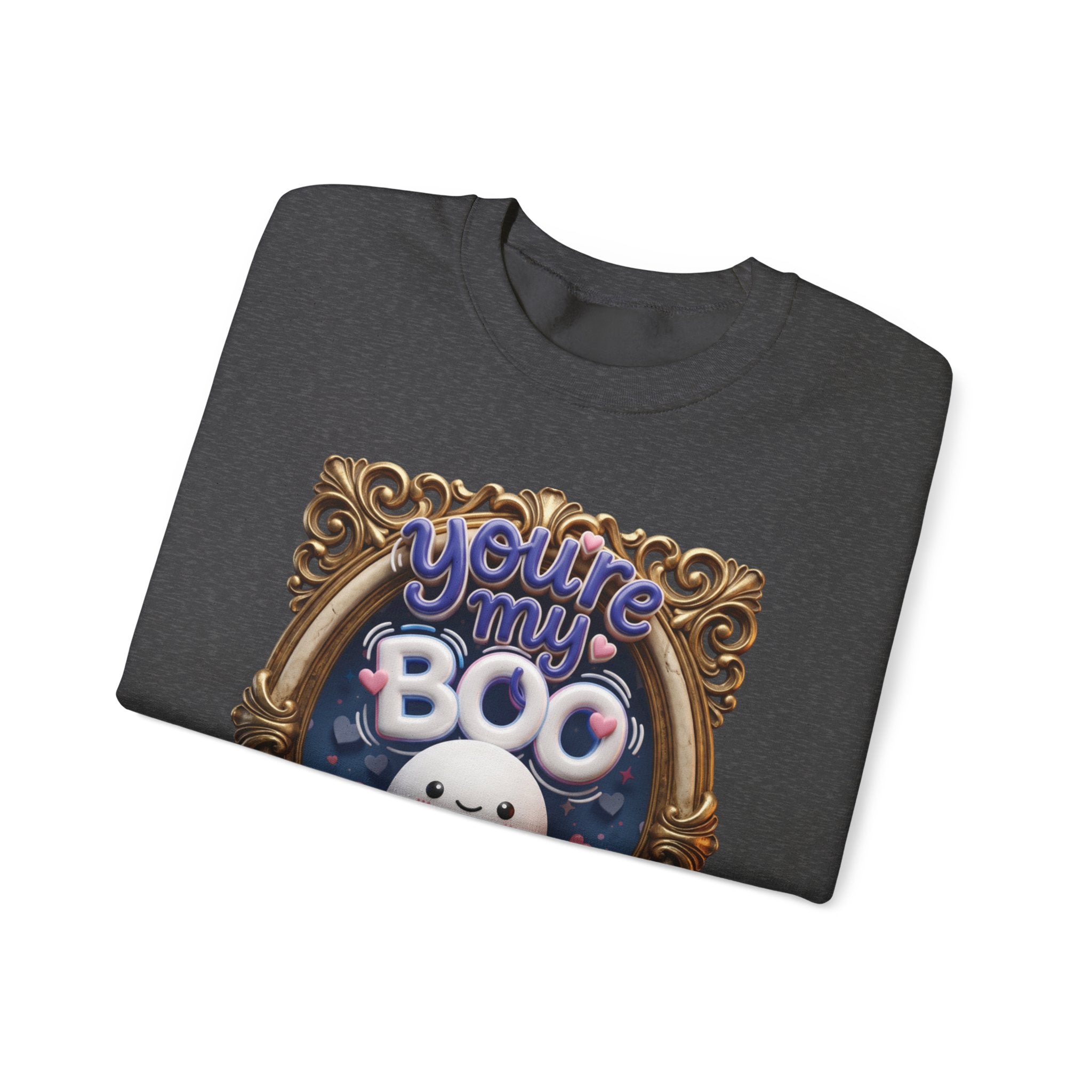 Dark Heather crewneck sweatshirt folded to show the round smiling ghost floats inside a gilded vintage frame print