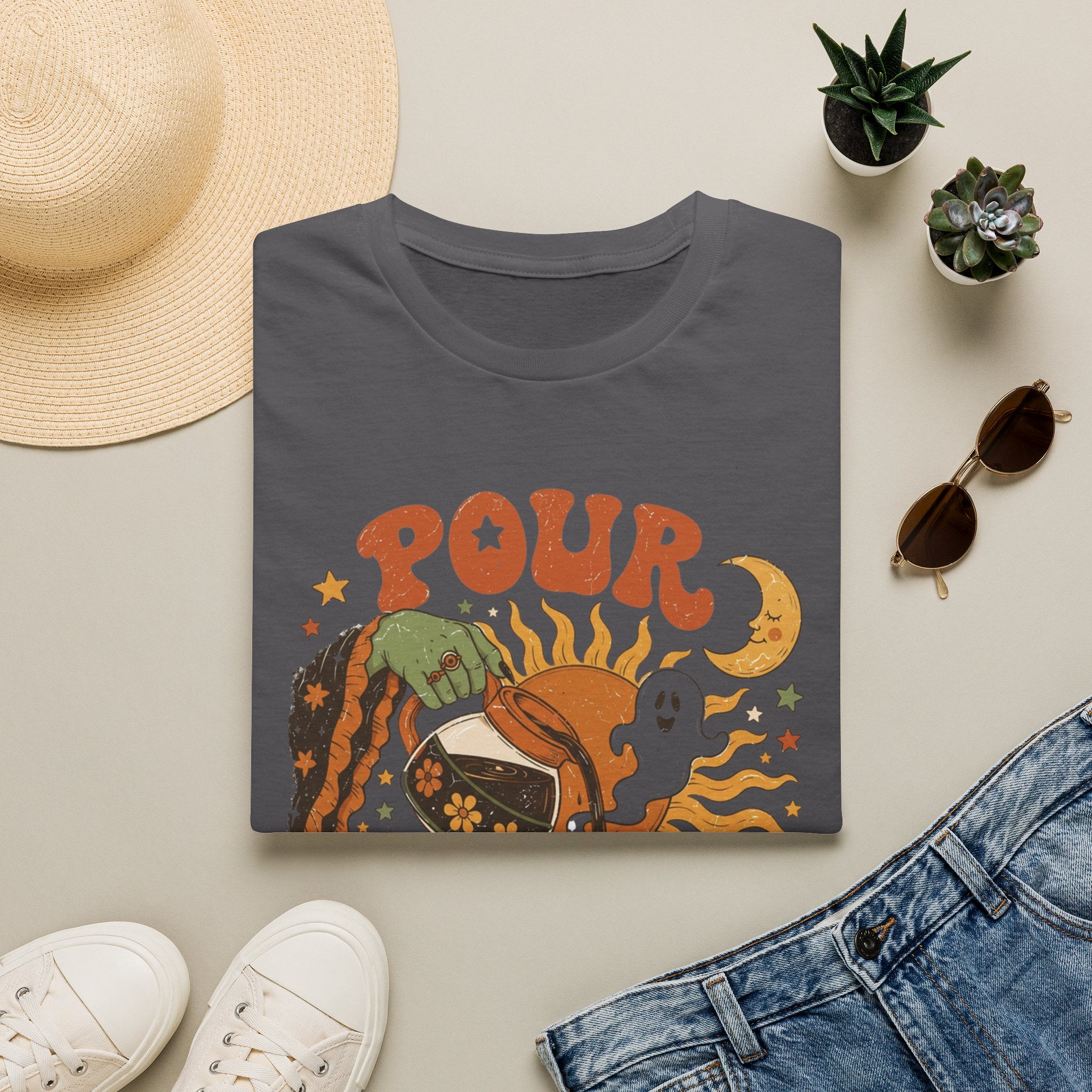 Charcoal t-shirt styled flat with a candle — green witch hand pouring coffee