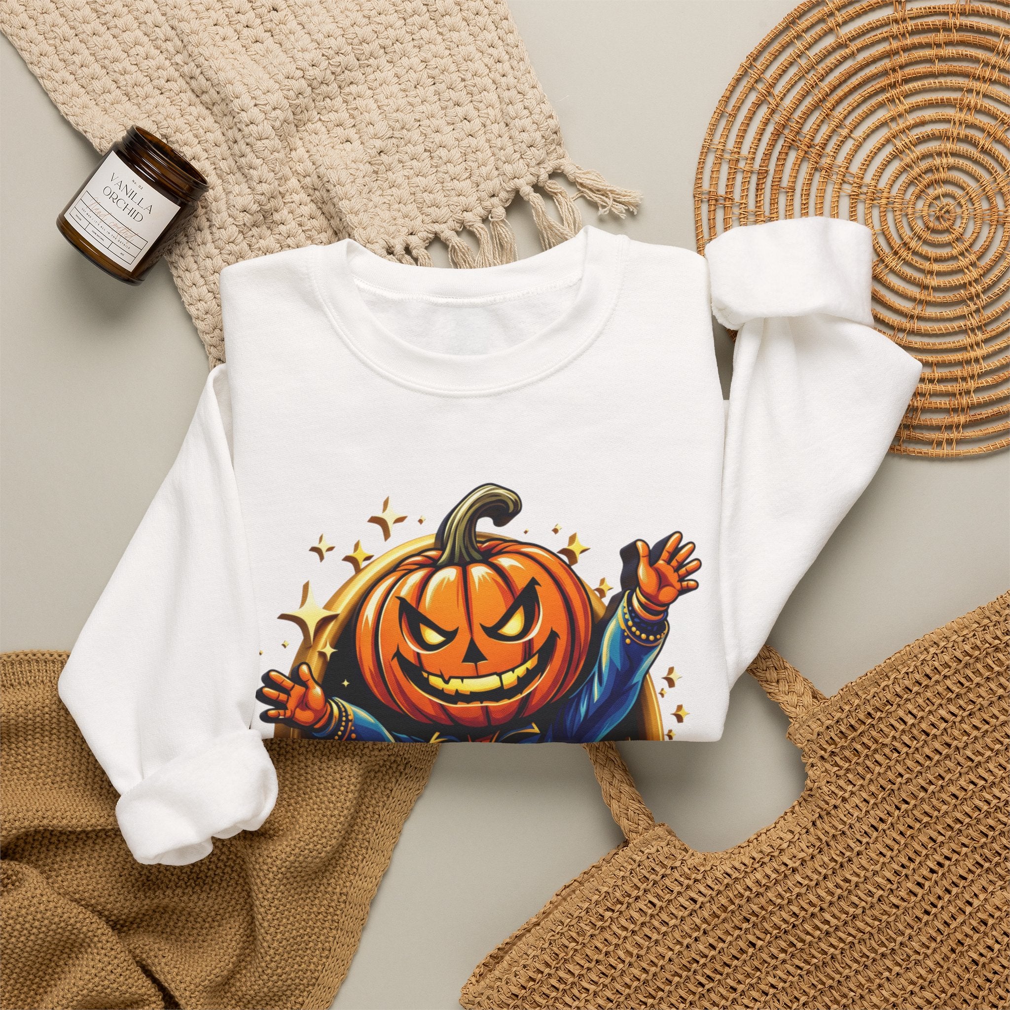 White crewneck sweatshirt styled flat with a candle — jack-o-lantern head in a blue jacket