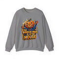 Graphite Heather crewneck sweatshirt laid flat, printed with a grinning jack-o-lantern head in a blue jacket throws