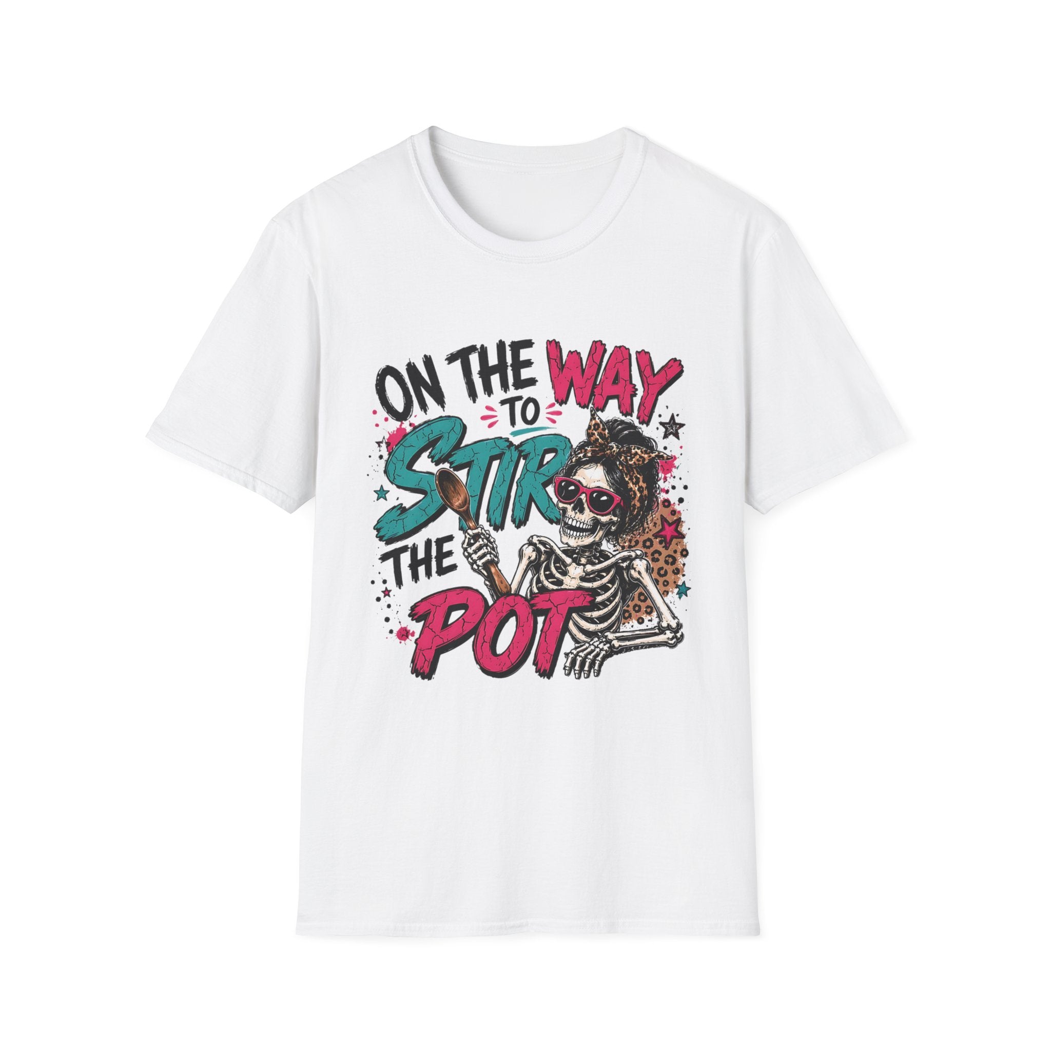White t-shirt laid flat, printed with a skeleton and bold teal and pink lettering reading