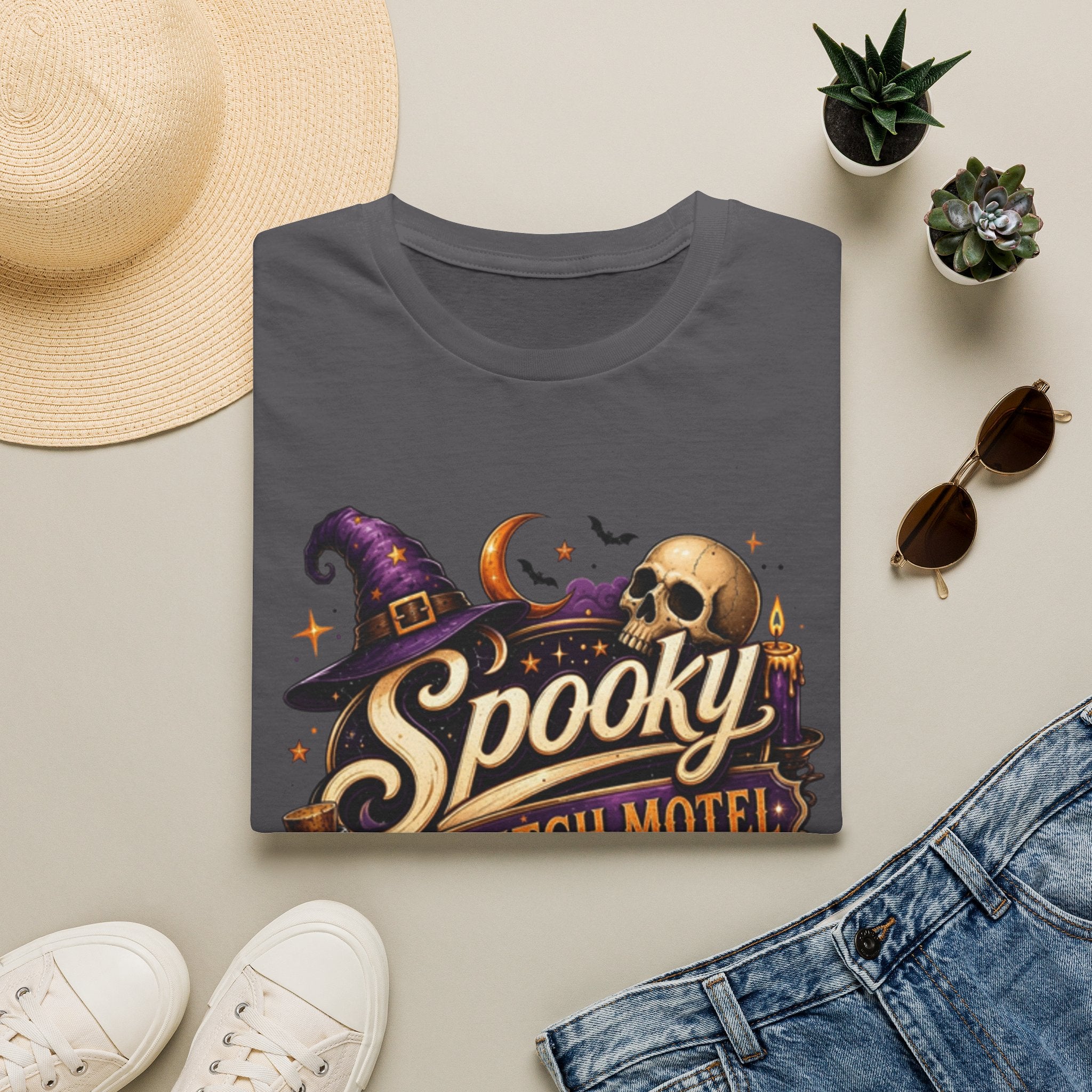 Charcoal t-shirt styled flat with a candle — neon Spooky Witch Motel sign