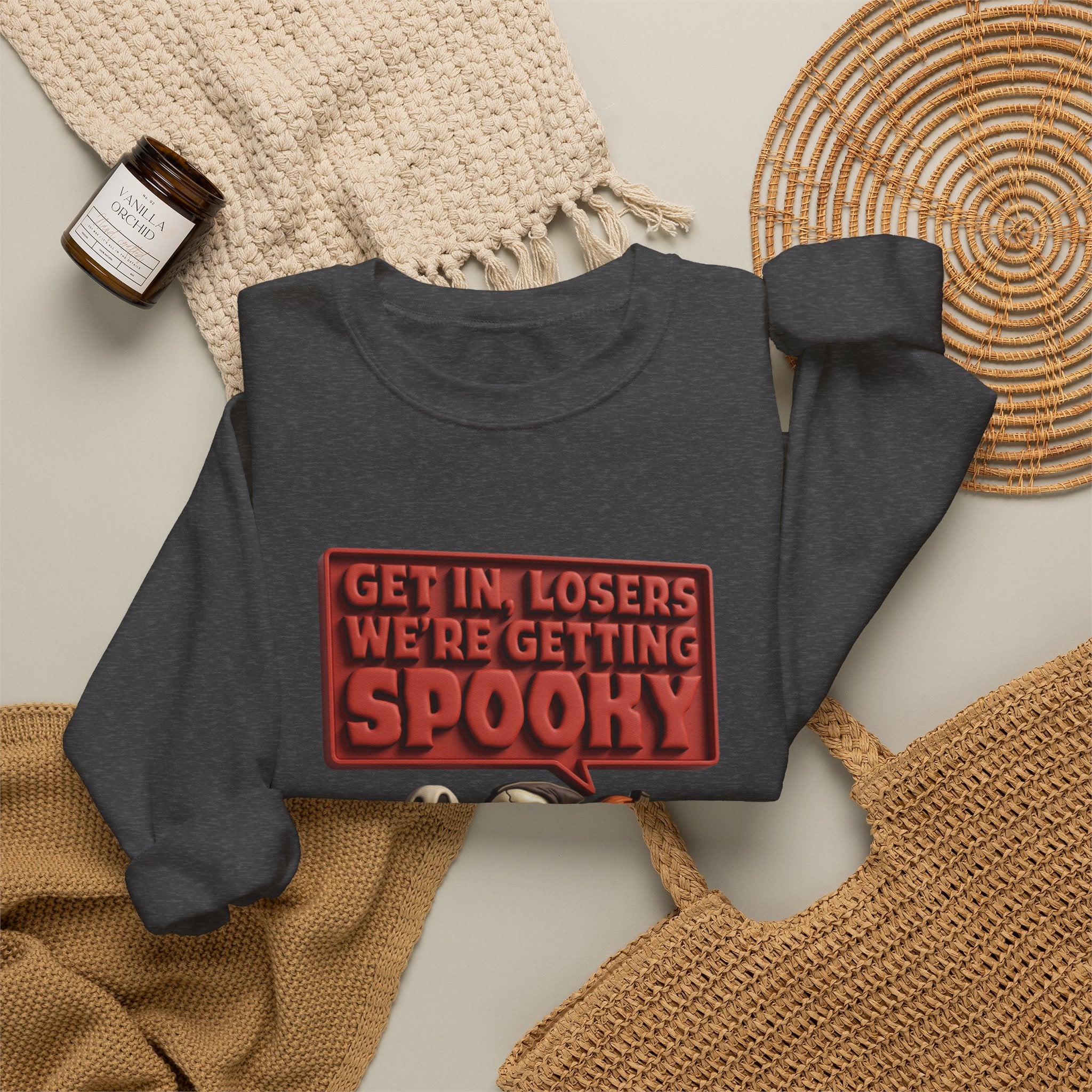 Dark Heather crewneck sweatshirt styled flat with a candle — ghosts in a retro convertible