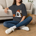 Dark Heather Grey t-shirt laid flat, printed with a small ghost in a knitted beanie holding a hand-painted