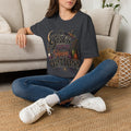 Dark Heather Grey t-shirt laid flat, printed with a hand-lettered script reading a girl's gotta have options