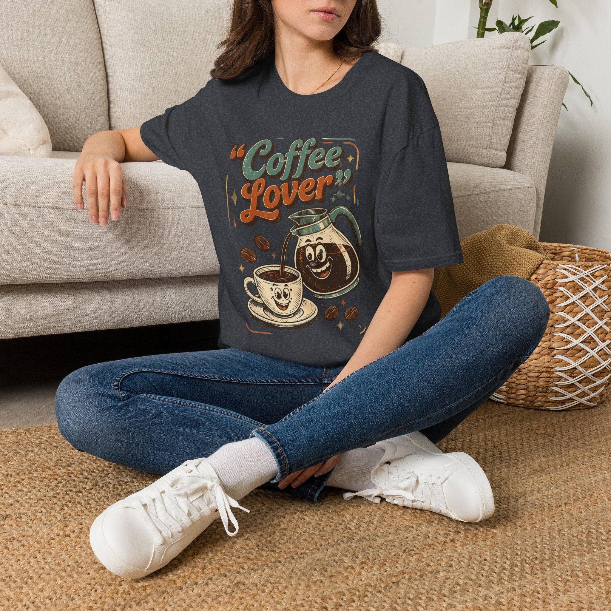 Dark Heather Grey t-shirt laid flat, printed with a retro coffee pot and steaming cup under the words