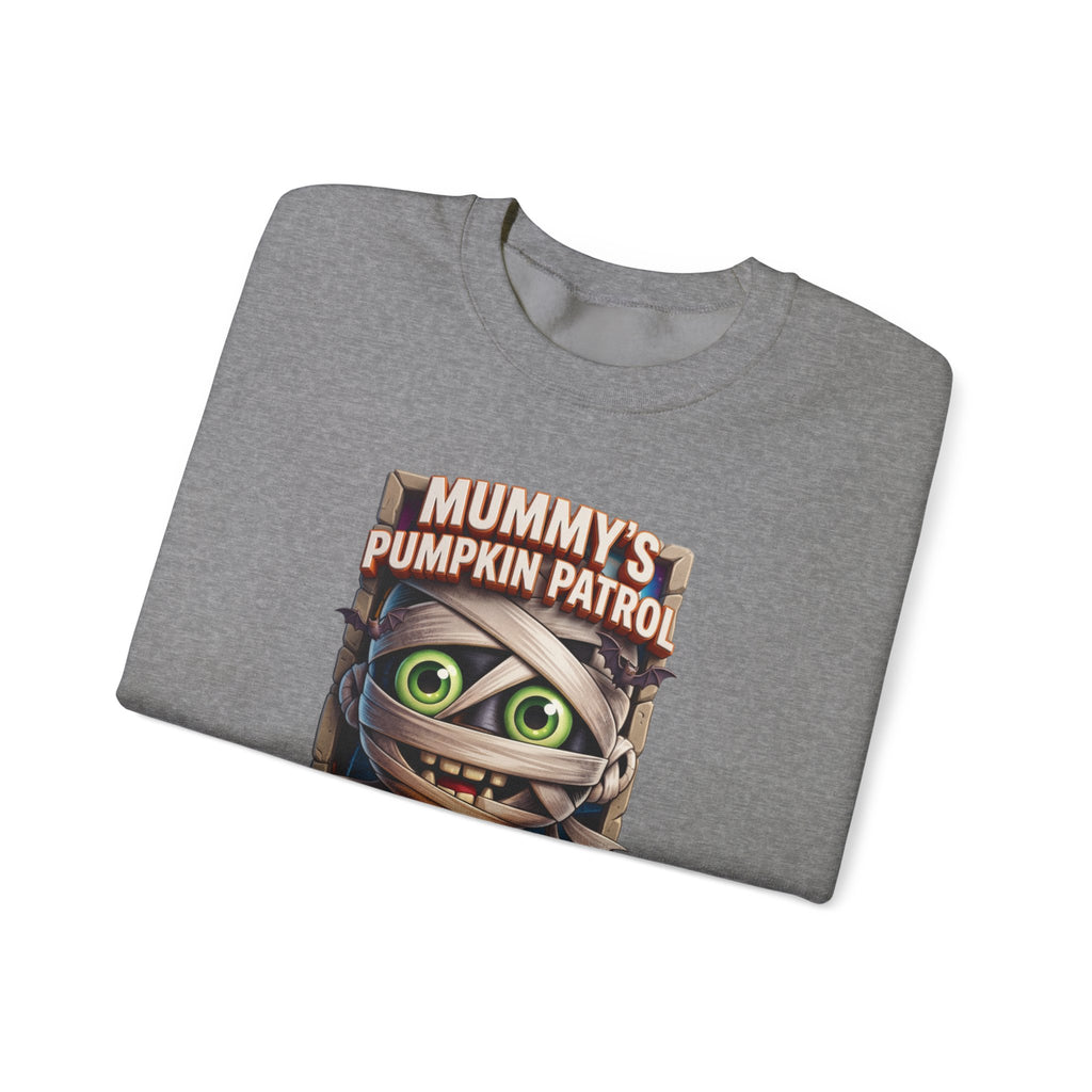 Graphite Heather crewneck sweatshirt folded to show the wide-eyed cartoon mummy wrapped in bandages hugs a carved print
