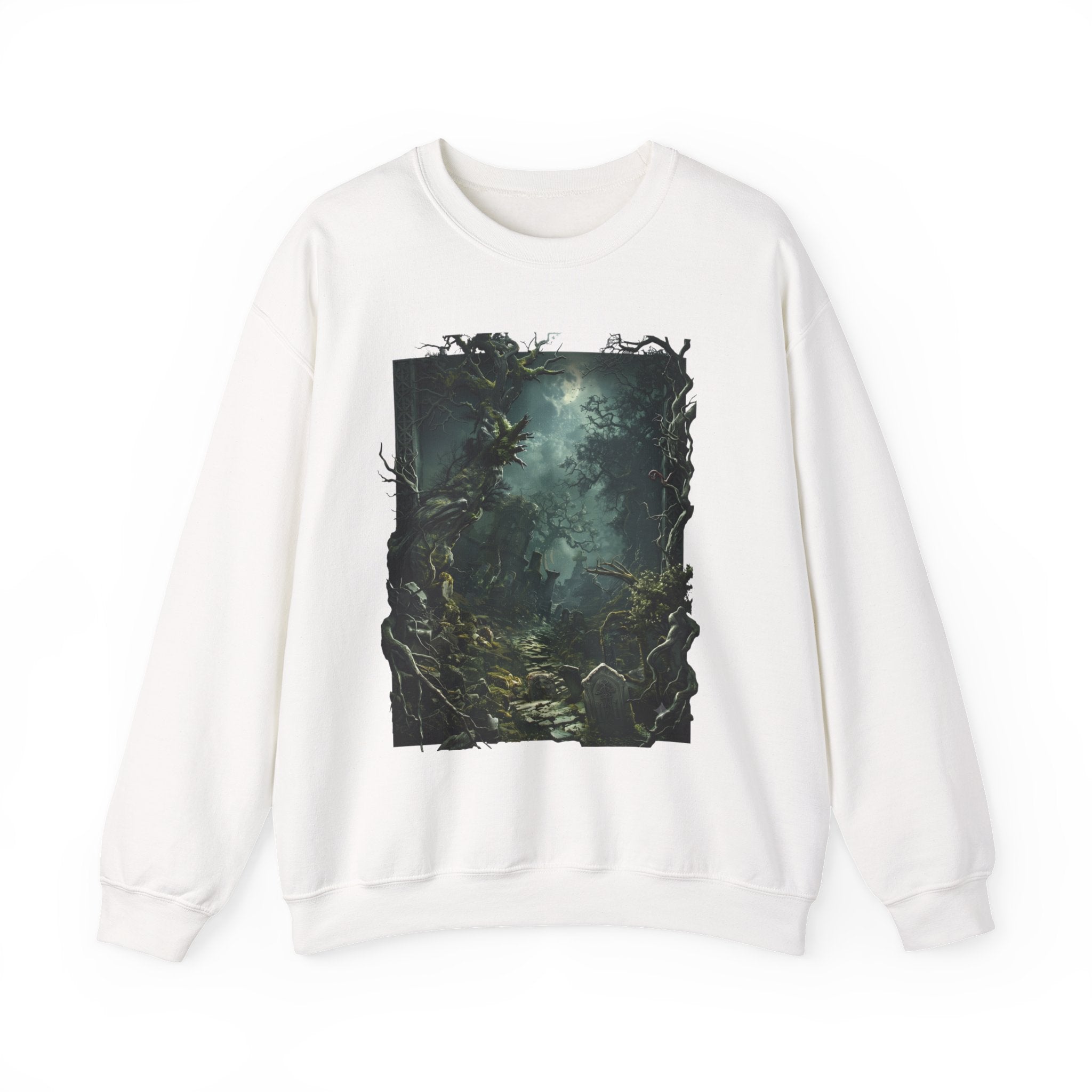 White crewneck sweatshirt laid flat, printed with a moonlit forest of gnarled mossy trees drifts into pale
