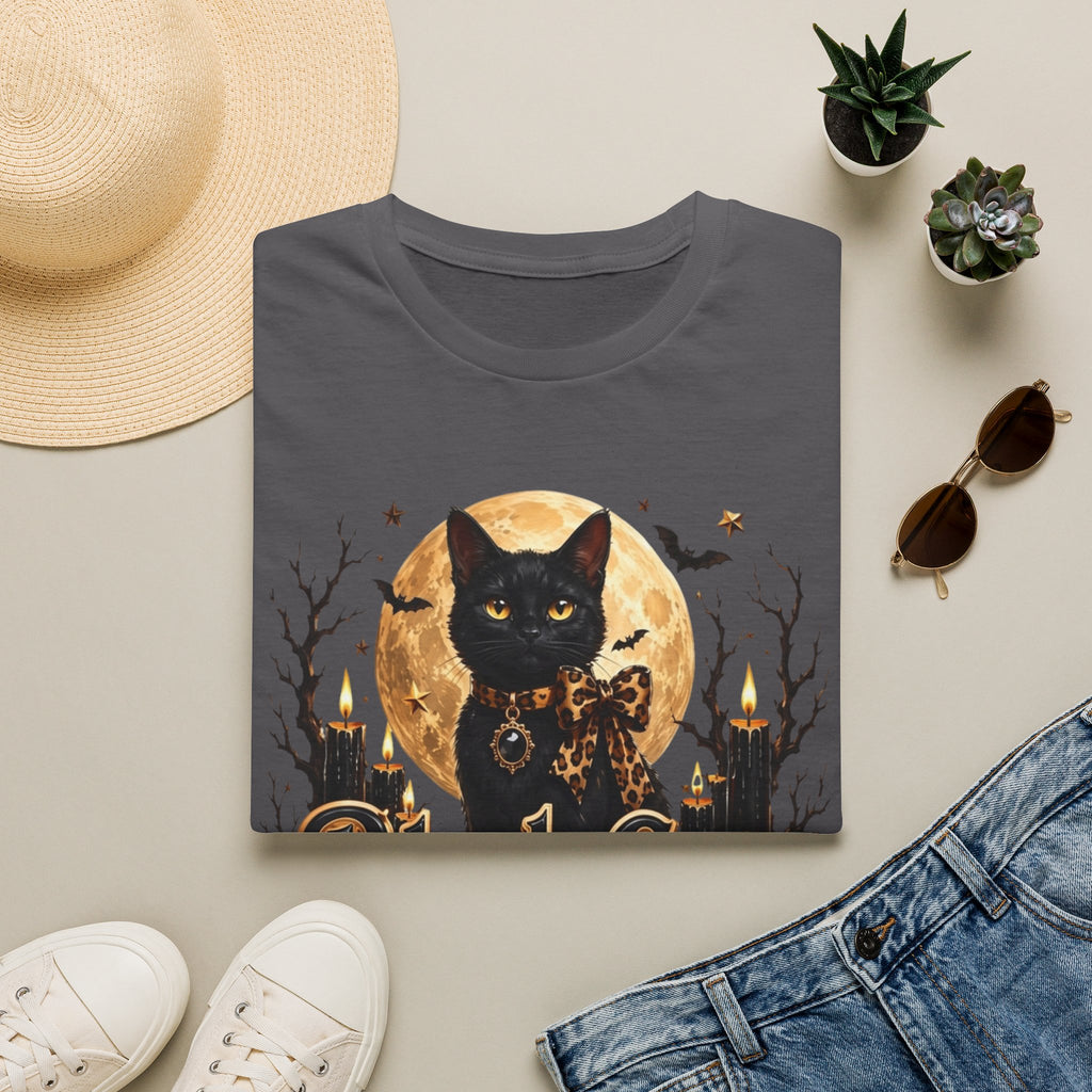 Charcoal t-shirt styled flat with a candle — black cat before a full moon