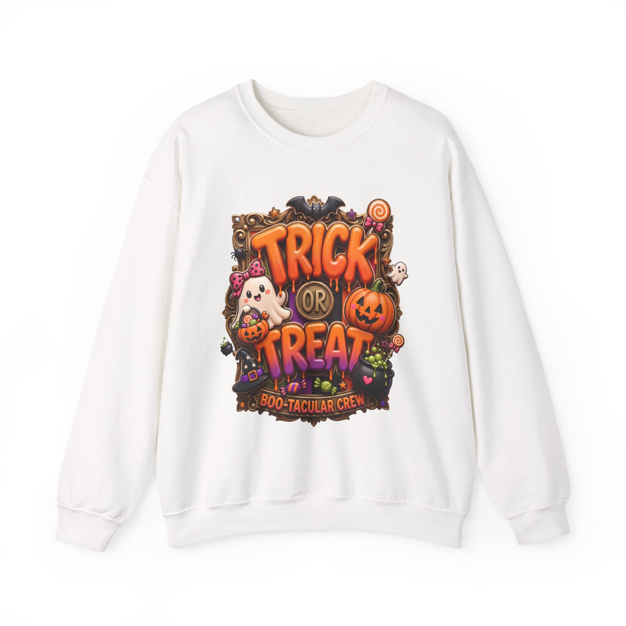 White crewneck sweatshirt laid flat, printed with a puffy orange trick or treat lettering frames a bow-wearing