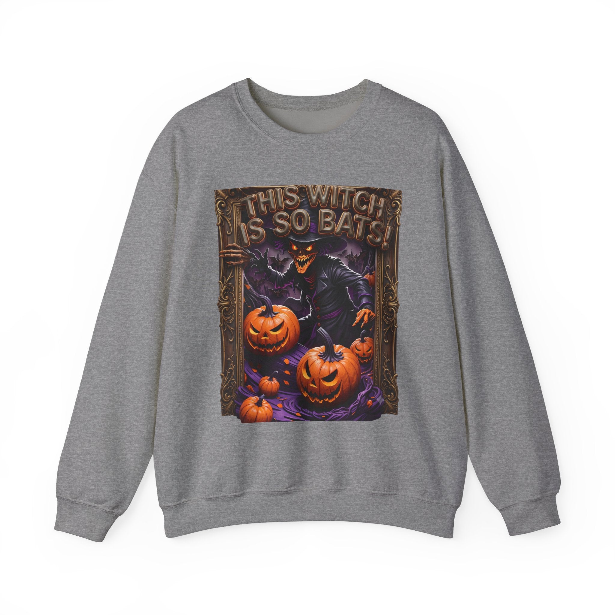 Graphite Heather crewneck sweatshirt laid flat, printed with a grinning witch in a pointed hat looms over glowing