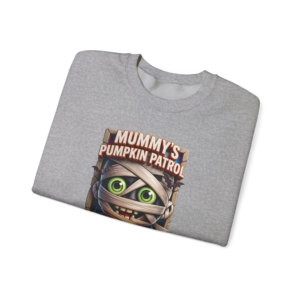Sport Grey crewneck sweatshirt folded to show the wide-eyed cartoon mummy wrapped in bandages hugs a carved print