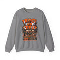 Graphite Heather crewneck sweatshirt laid flat, printed with a stacked orange and black lettering spells out the classic