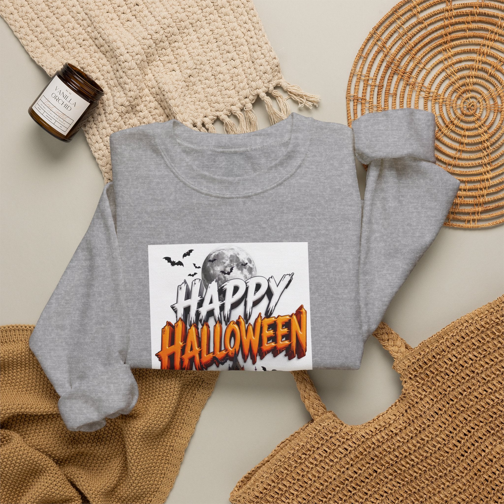 Sport Grey crewneck sweatshirt styled flat with a candle — haunted house with pumpkins and ghosts