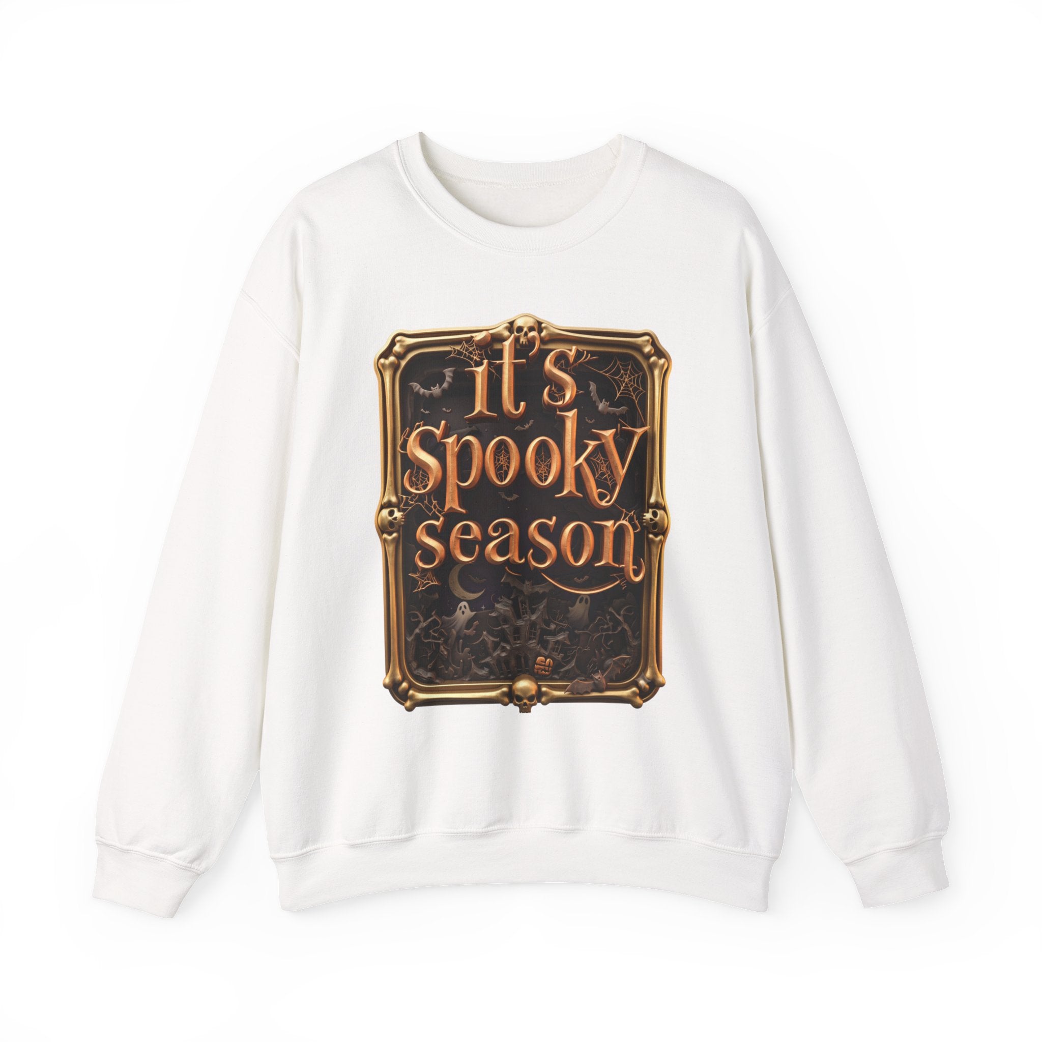 White crewneck sweatshirt laid flat, printed with a copper serif lettering reads it's spooky season inside