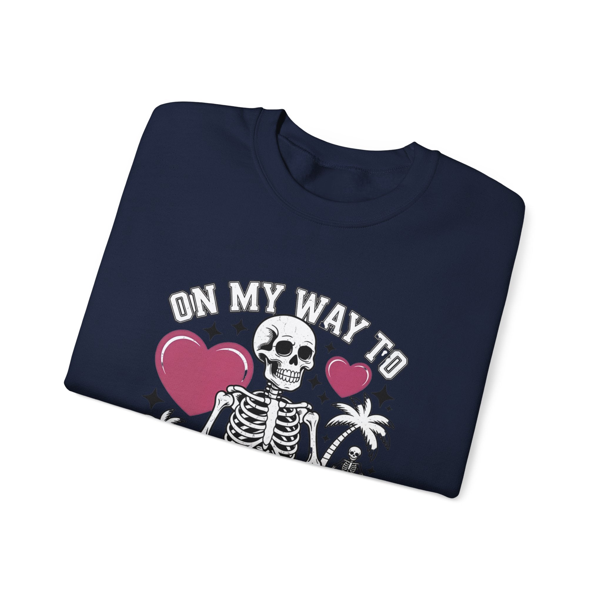 Navy crewneck sweatshirt folded to show the two line drawn skeletons under pink hearts print