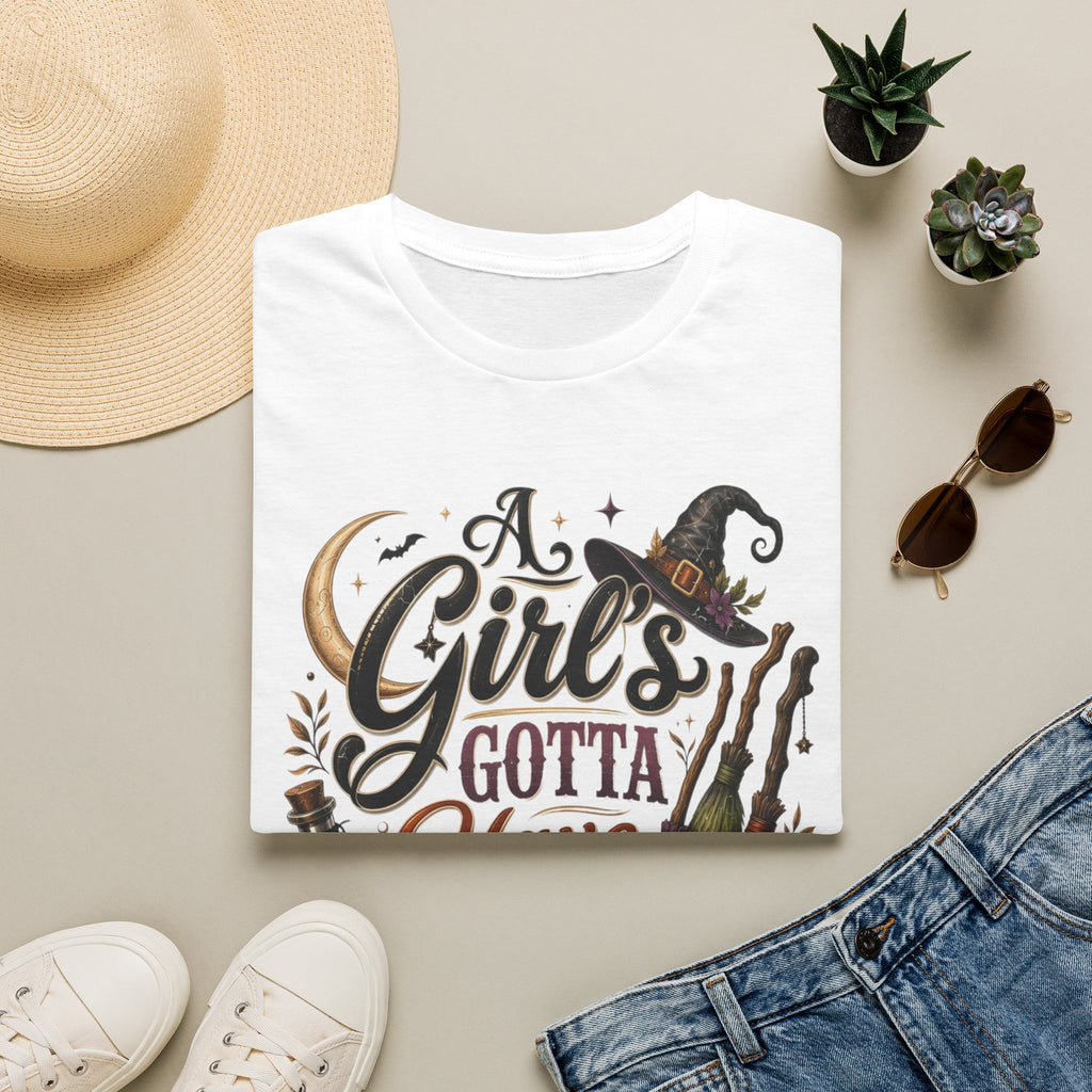 White t-shirt styled flat with a candle — hand-lettered A Girl's Gotta Have Options