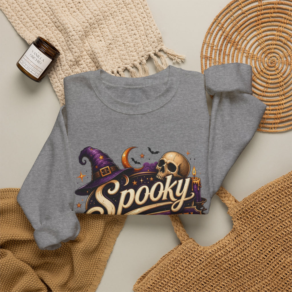 Graphite Heather crewneck sweatshirt styled flat with a candle — neon Spooky Witch Motel sign
