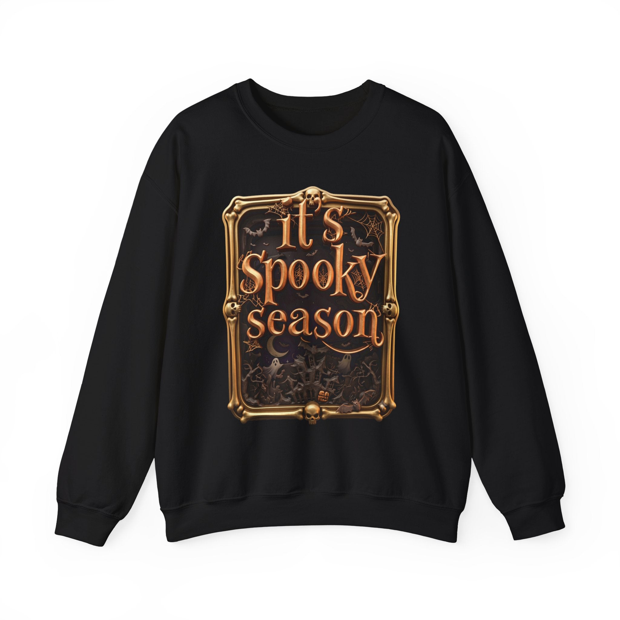 Black crewneck sweatshirt laid flat, printed with a copper serif lettering reads it's spooky season inside