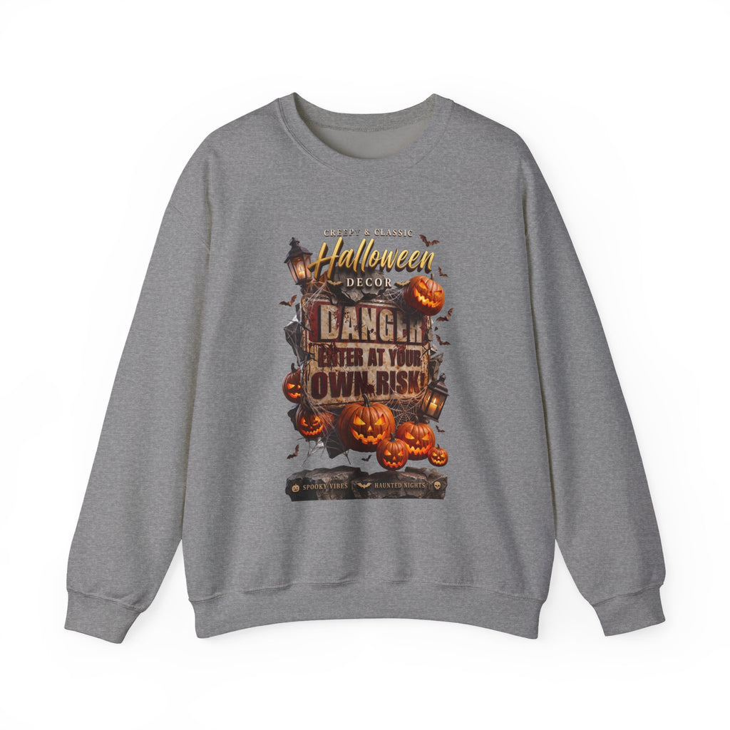 Graphite Heather crewneck sweatshirt laid flat, printed with a aged danger sign hangs above a cluster of glowing