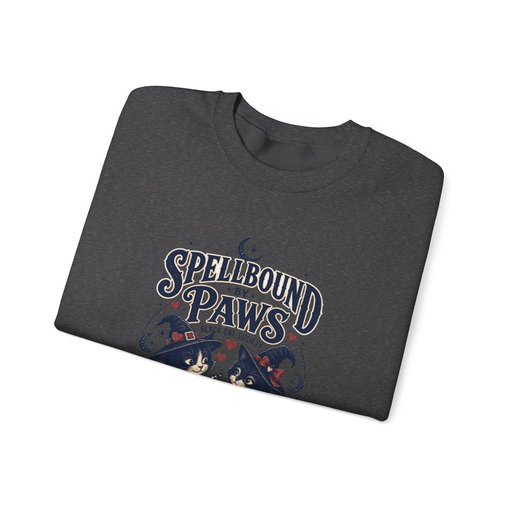 Dark Heather crewneck sweatshirt folded to show the two black cats in witch hats print