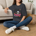Dark Heather Grey t-shirt laid flat, printed with a pink convertible car and a skull