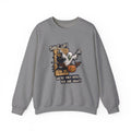 Graphite Heather crewneck sweatshirt laid flat, printed with a green-eyed ghost with bat wings bursts through a wooden