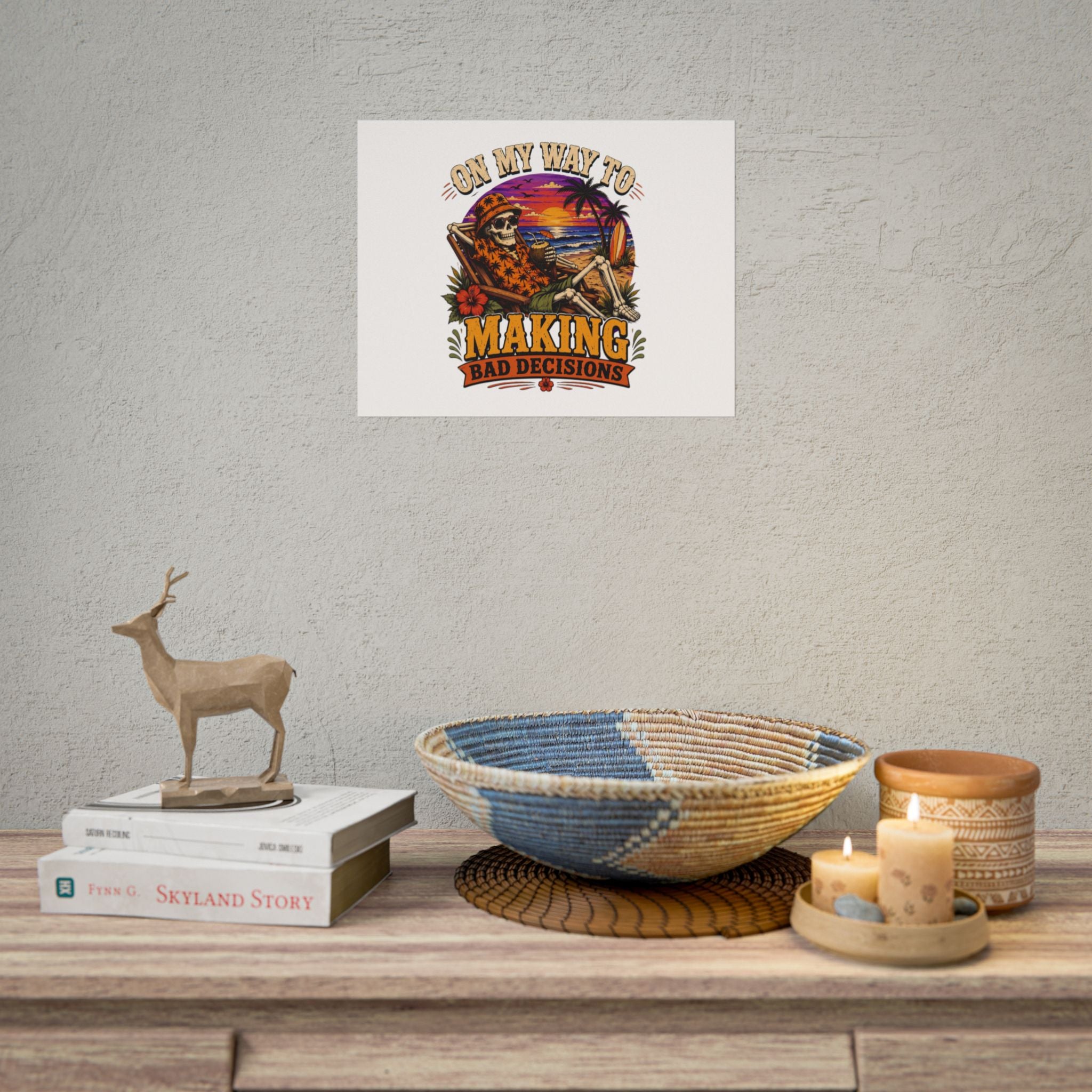 Poster print showing a grinning skeleton stretched out under a burning tropical sunset, view 16