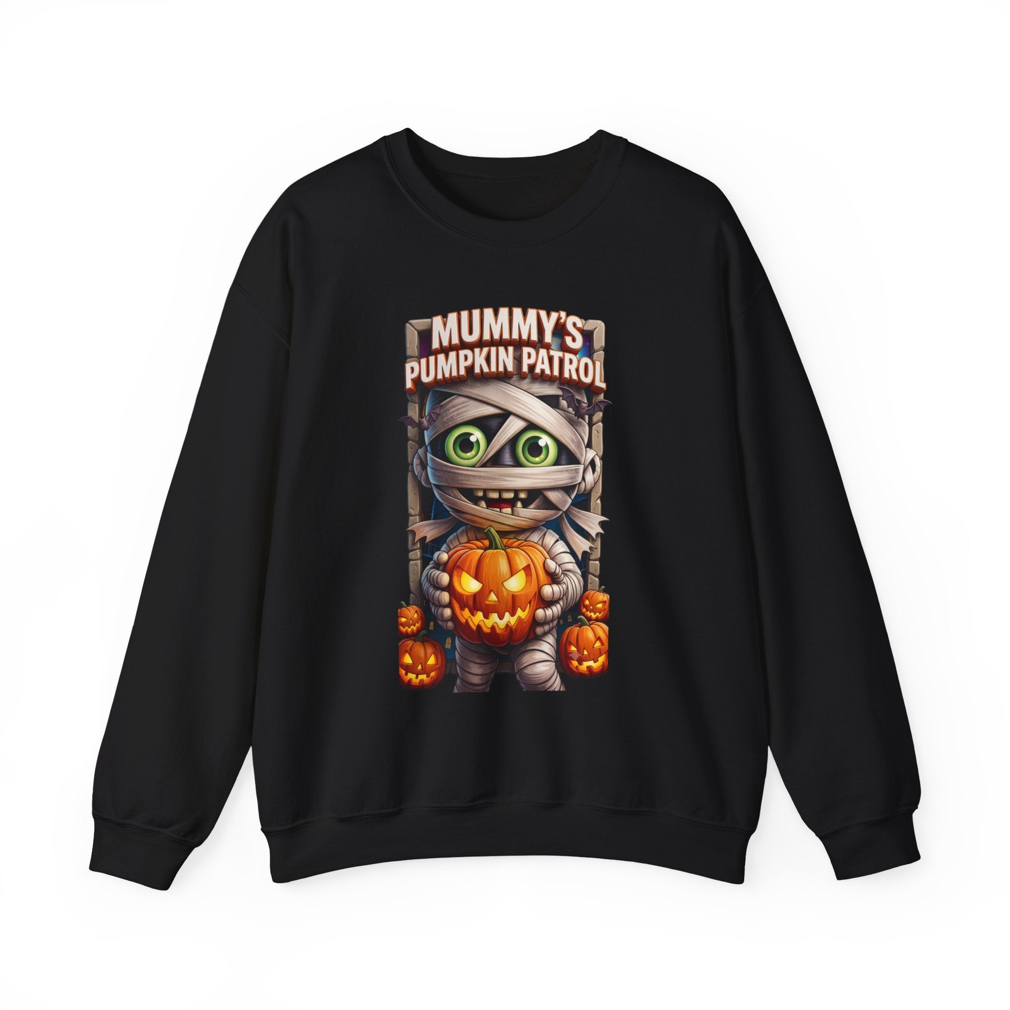 Black crewneck sweatshirt laid flat, printed with a wide-eyed cartoon mummy wrapped in bandages hugs a carved