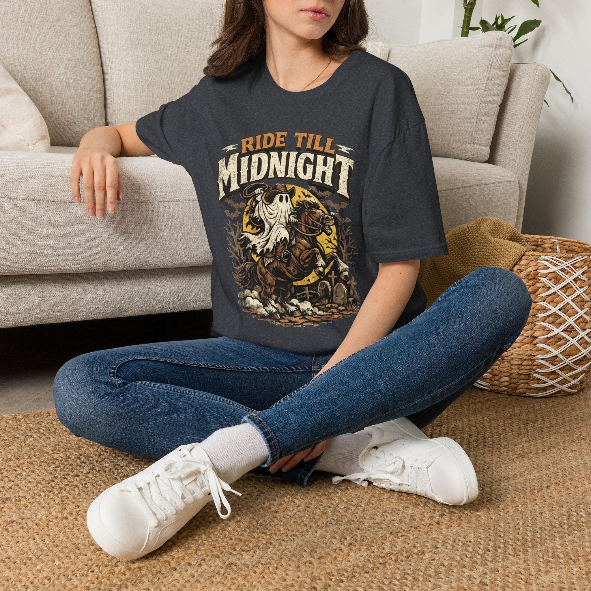Dark Heather Grey t-shirt laid flat, printed with a sheet ghost in a wide-brim hat rides a rearing