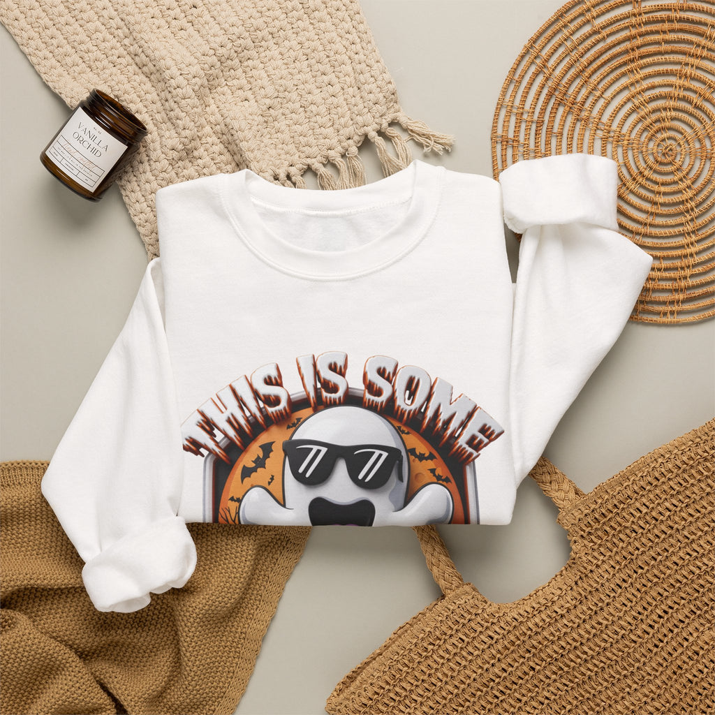 White crewneck sweatshirt styled flat with a candle — cartoon ghost in dark sunglasses