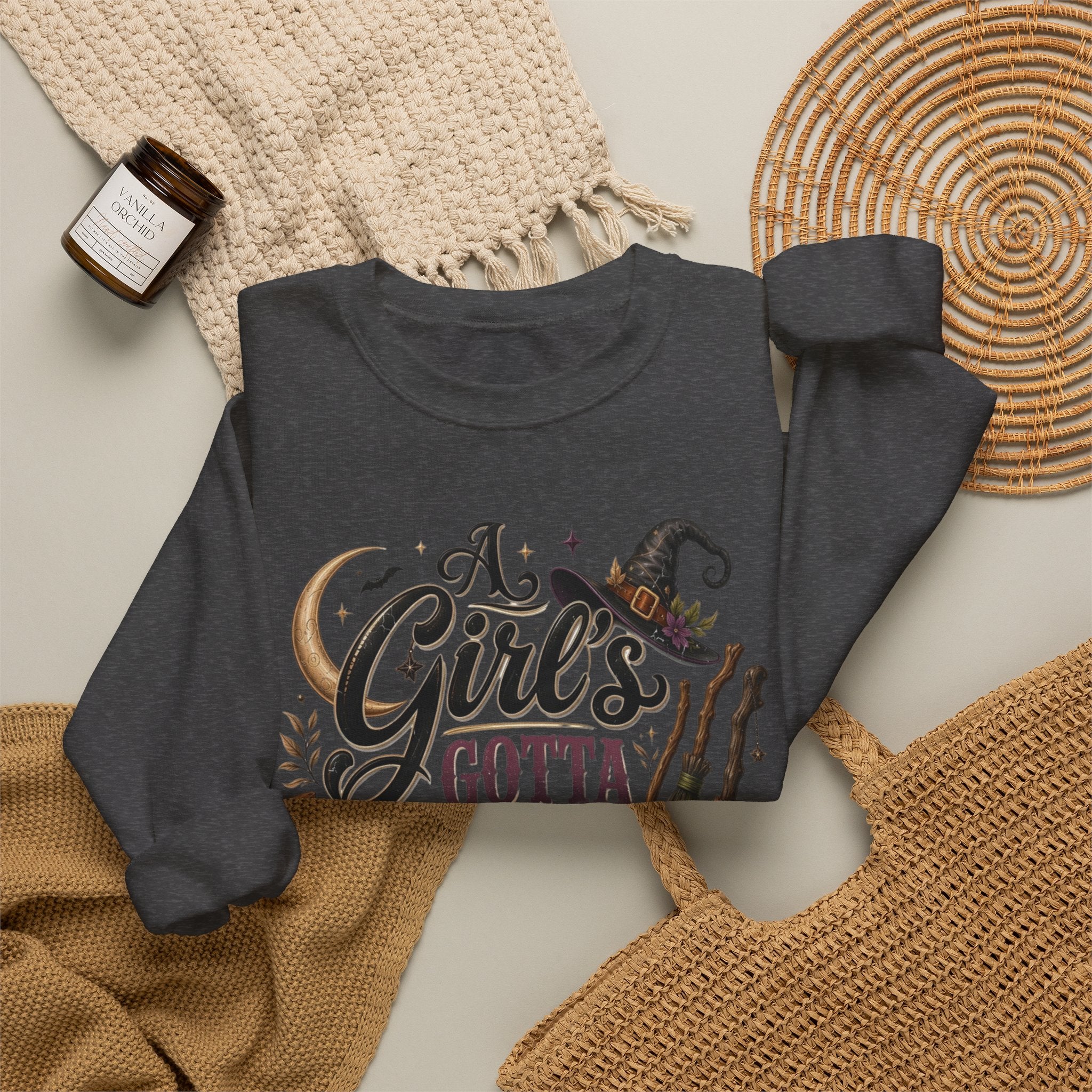 Dark Heather crewneck sweatshirt styled flat with a candle — hand-lettered A Girl's Gotta Have Options