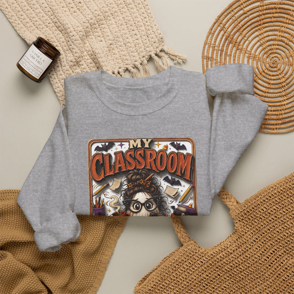 Sport Grey crewneck sweatshirt styled flat with a candle — bespectacled ghost grading papers