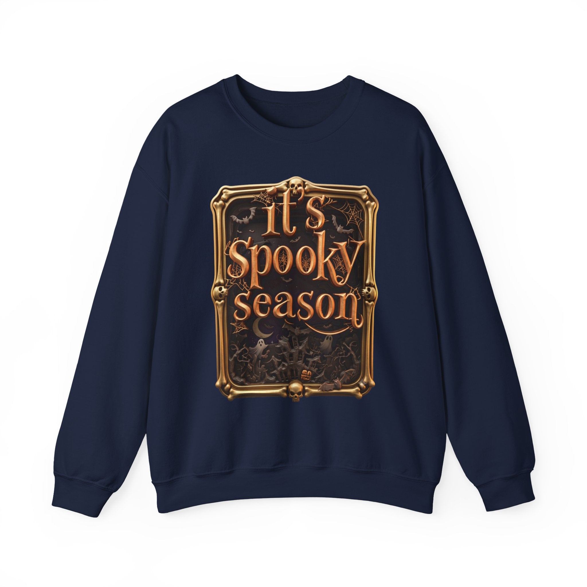 Navy crewneck sweatshirt laid flat, printed with a copper serif lettering reads it's spooky season inside