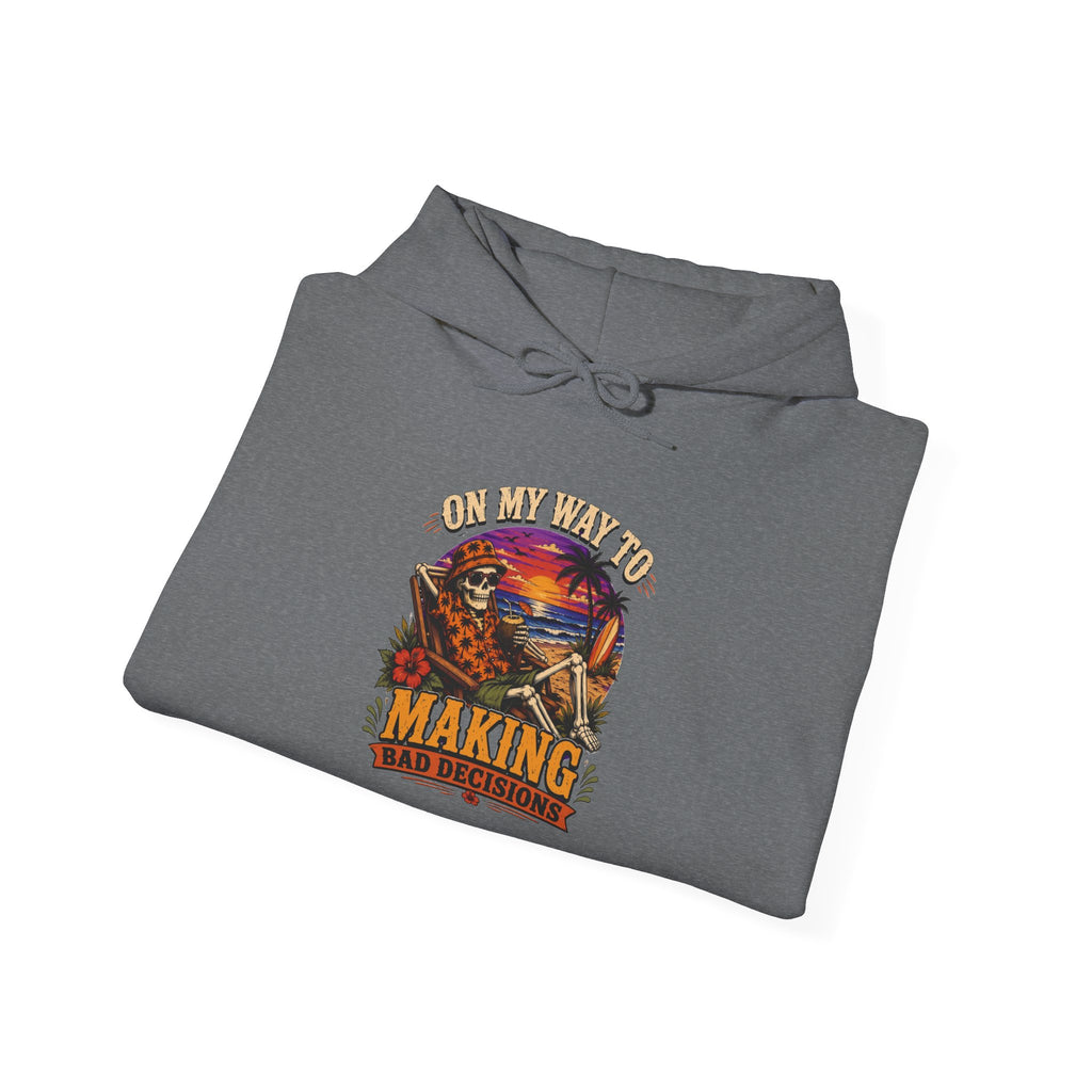 Graphite Heather hoodie styled flat with a candle — sunset skeleton print
