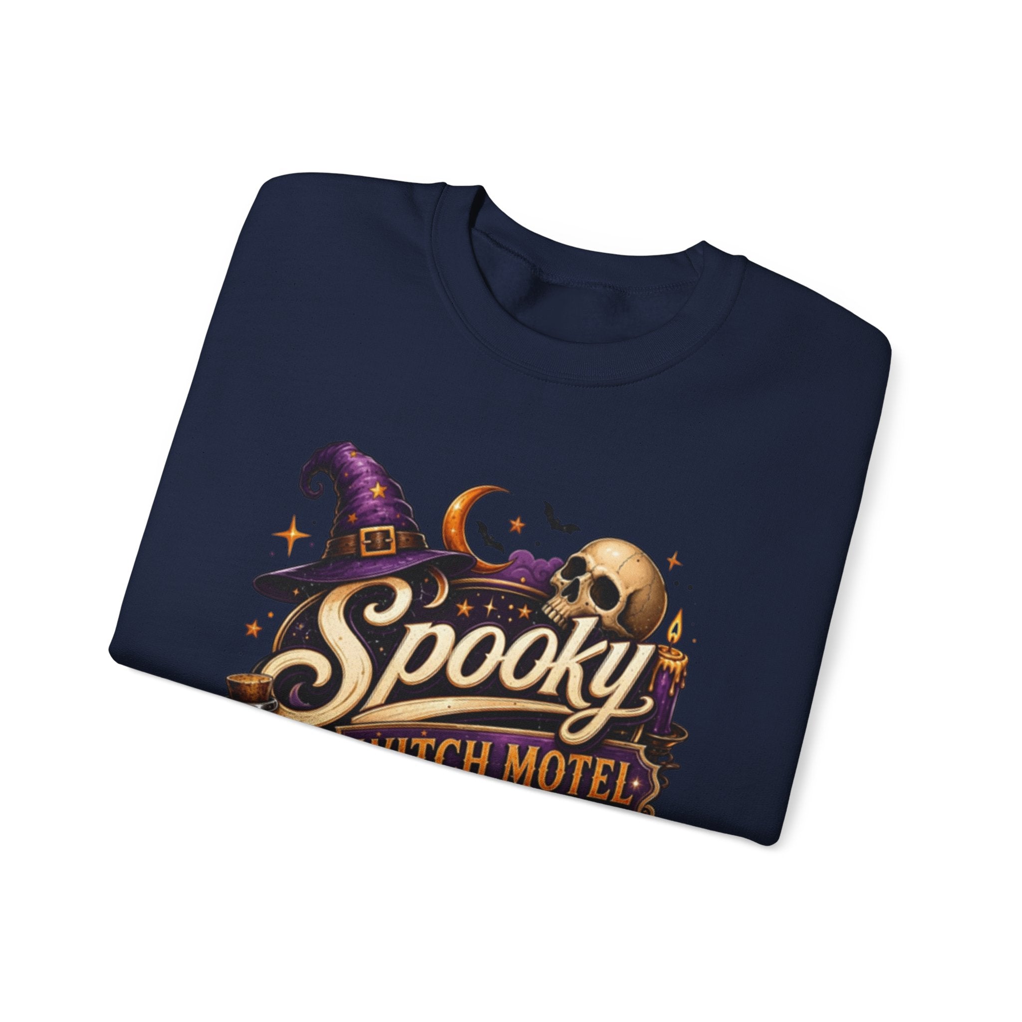 Navy crewneck sweatshirt folded to show the neon vintage motel sign reading spooky witch motel print